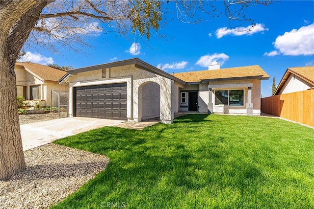 view of front of home with stucco siding, an attached garage, fence, driveway, and a front lawn