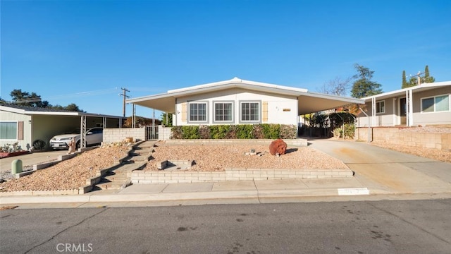 view of front of house with a carport