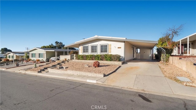 manufactured / mobile home with a carport