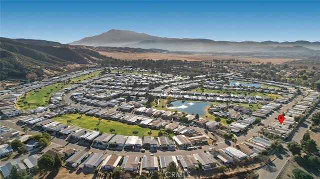 bird's eye view featuring a water and mountain view