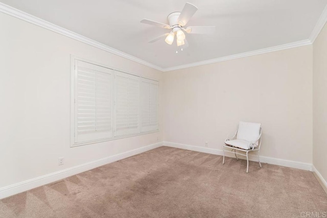 empty room with light carpet, ceiling fan, and crown molding