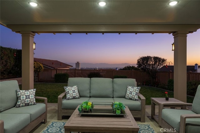 patio terrace at dusk with outdoor lounge area