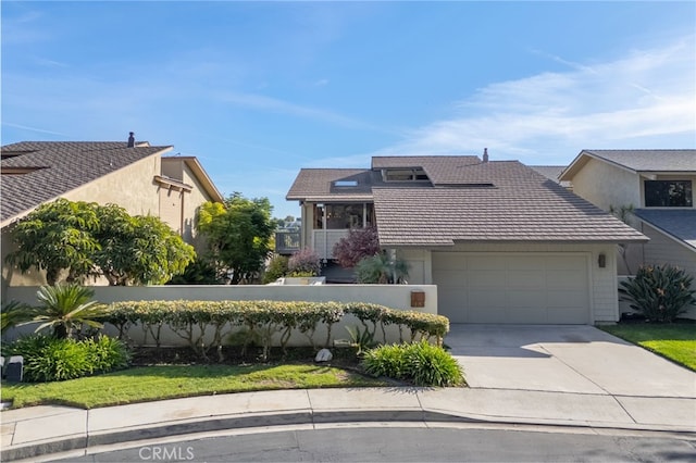 view of front of home with a garage