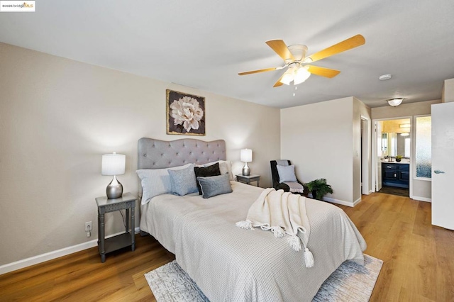 bedroom with ceiling fan and wood-type flooring