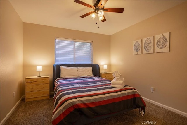 bedroom featuring ceiling fan and dark carpet