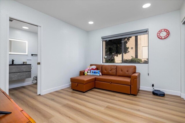 living area featuring light hardwood / wood-style flooring