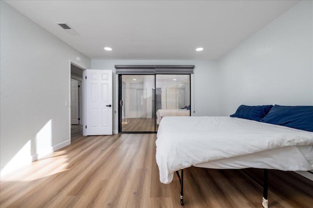 bedroom featuring light hardwood / wood-style flooring