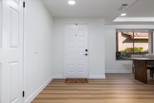 entrance foyer featuring wood-type flooring