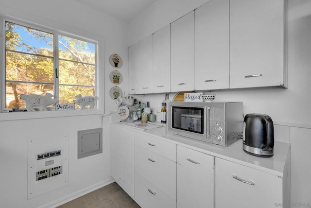 bar with white cabinetry