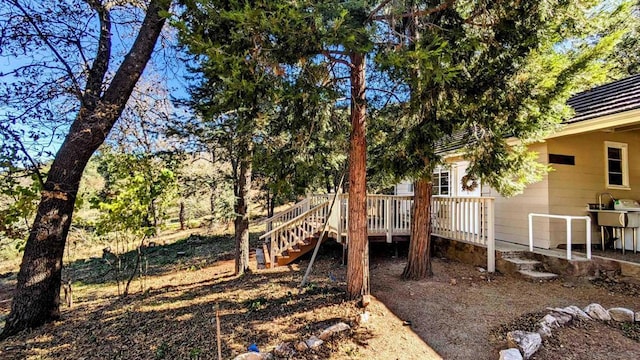 view of yard with a deck