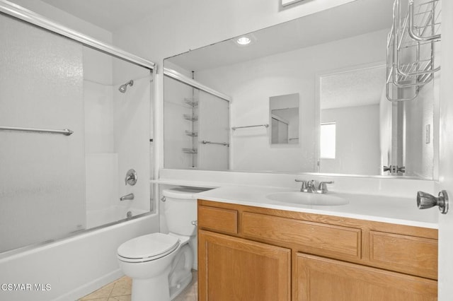 full bathroom with toilet, tile patterned flooring, enclosed tub / shower combo, and vanity