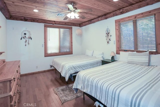 bedroom with ceiling fan, wooden ceiling, multiple windows, and hardwood / wood-style floors