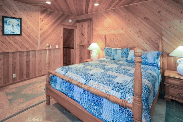 tiled bedroom with wood ceiling and wooden walls