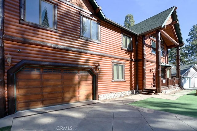 view of home's exterior featuring a garage