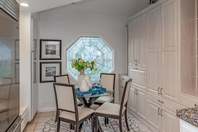 dining space with light tile patterned floors