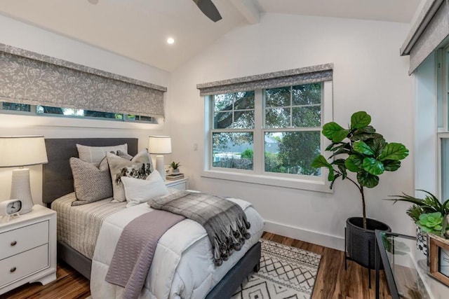 bedroom featuring dark wood-type flooring and lofted ceiling with beams