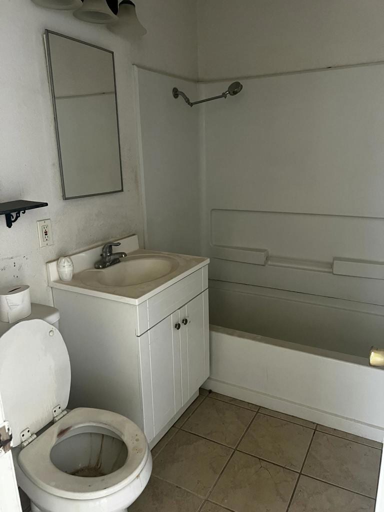 full bathroom with toilet, shower / tub combination, tile patterned floors, and vanity