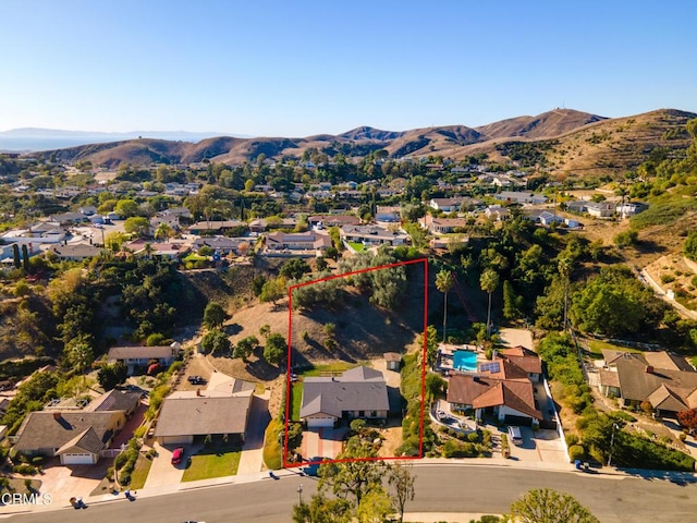 drone / aerial view featuring a mountain view