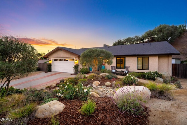 ranch-style home with a garage