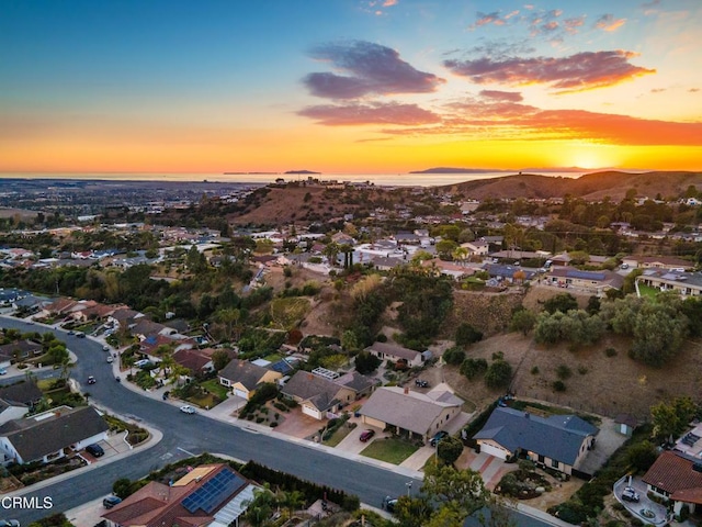 aerial view at dusk with a mountain view