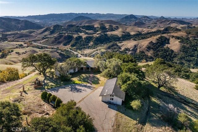 drone / aerial view featuring a mountain view