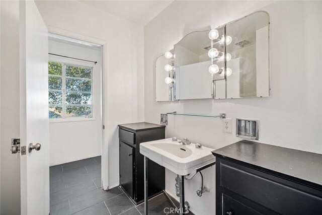 bathroom with tile patterned flooring