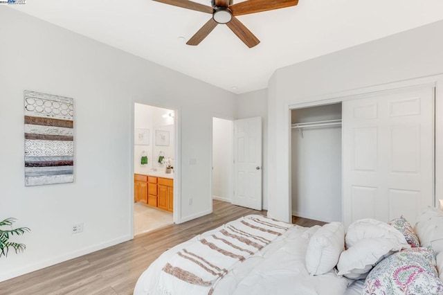 bedroom with ceiling fan, a closet, light hardwood / wood-style flooring, and ensuite bath