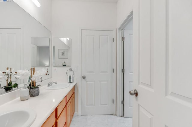 bathroom with vanity and tile patterned floors