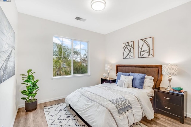 bedroom featuring light hardwood / wood-style floors