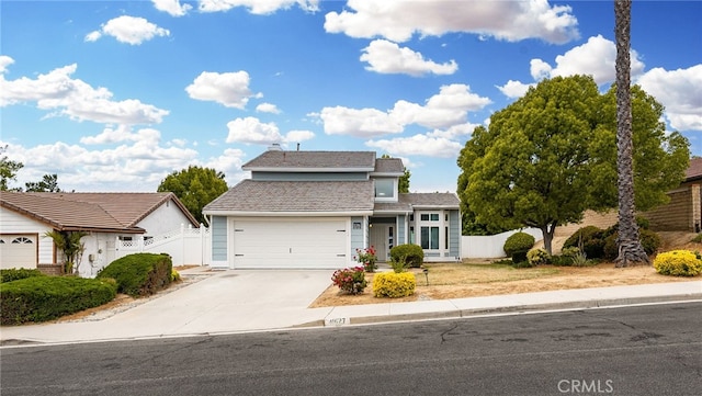 front of property with a garage