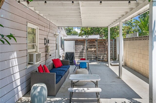 view of patio / terrace with cooling unit, an outdoor living space, and a grill