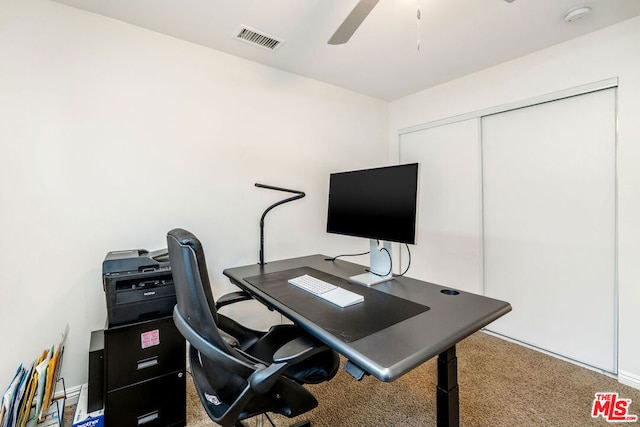 office featuring ceiling fan and carpet flooring