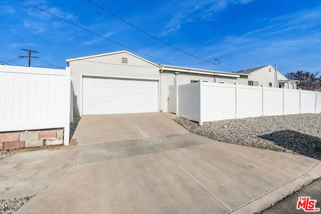 exterior space featuring a garage