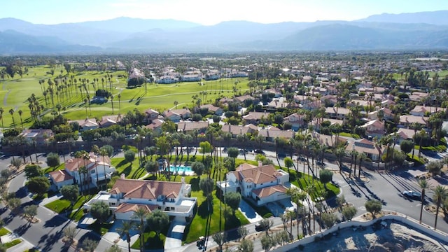 birds eye view of property featuring a mountain view