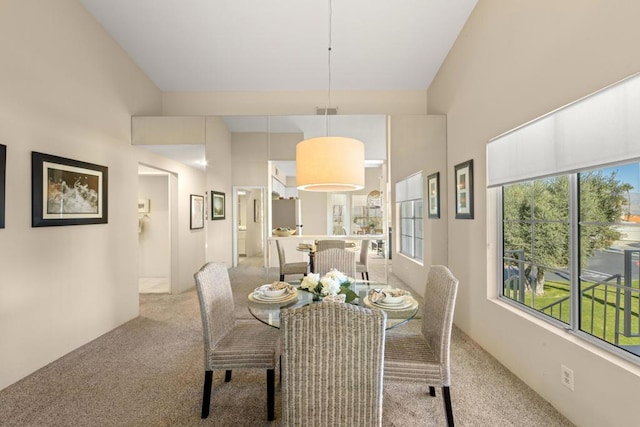 view of carpeted dining area