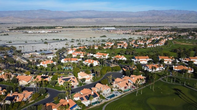 bird's eye view with a water and mountain view