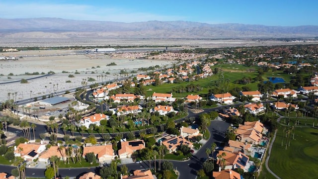 bird's eye view with a water and mountain view