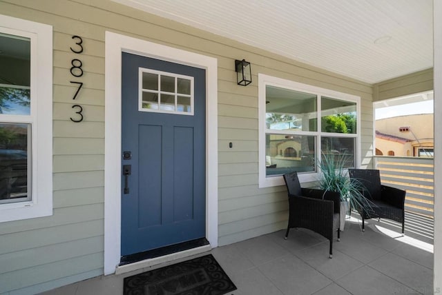 entrance to property with covered porch