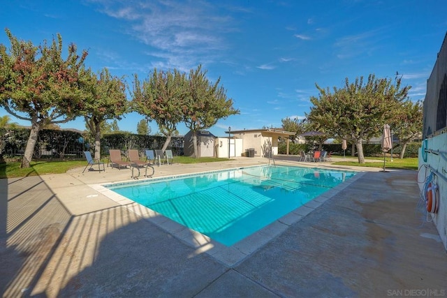 view of pool with a patio