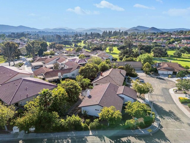 bird's eye view with a mountain view