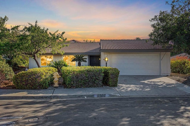 view of front of property featuring a garage