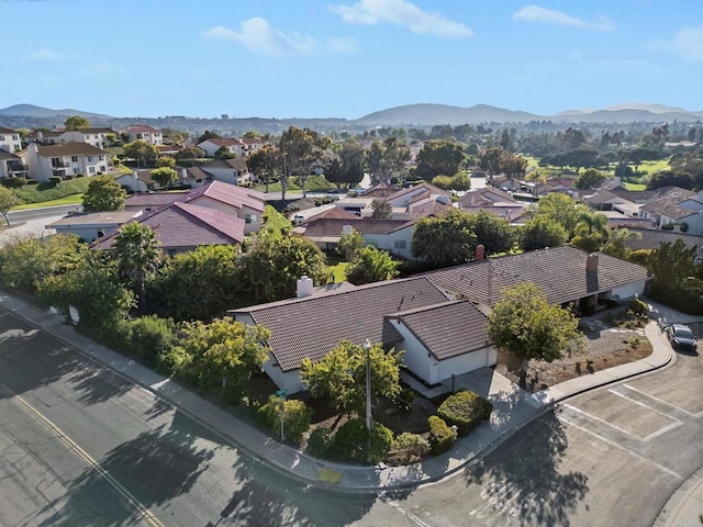 drone / aerial view featuring a mountain view