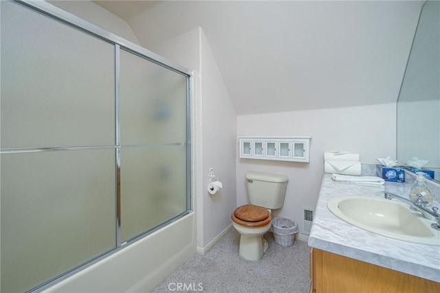 full bathroom featuring combined bath / shower with glass door, vanity, lofted ceiling, and toilet