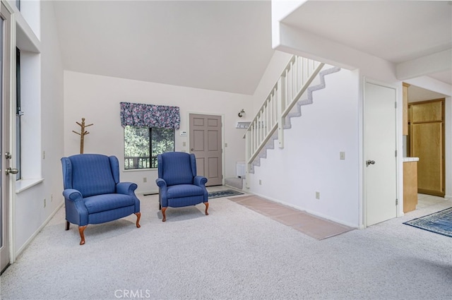 sitting room with light carpet