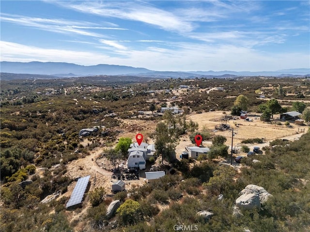 drone / aerial view featuring a mountain view