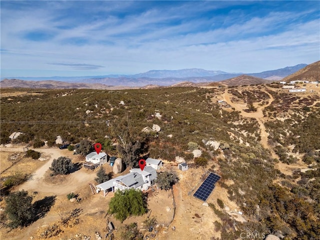 drone / aerial view featuring a mountain view