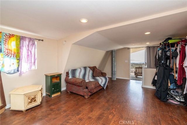 bedroom featuring dark wood-type flooring and lofted ceiling