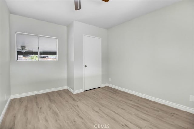 empty room with light hardwood / wood-style floors