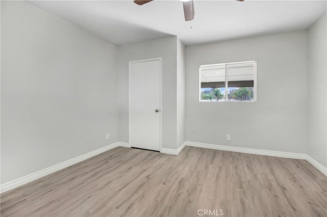 unfurnished room with light hardwood / wood-style floors