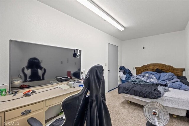 bedroom featuring carpet